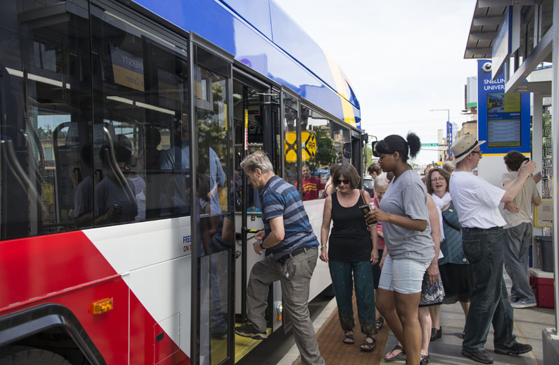 Customers board the A Line at Snelling and University avenues on Saturday, June 11.