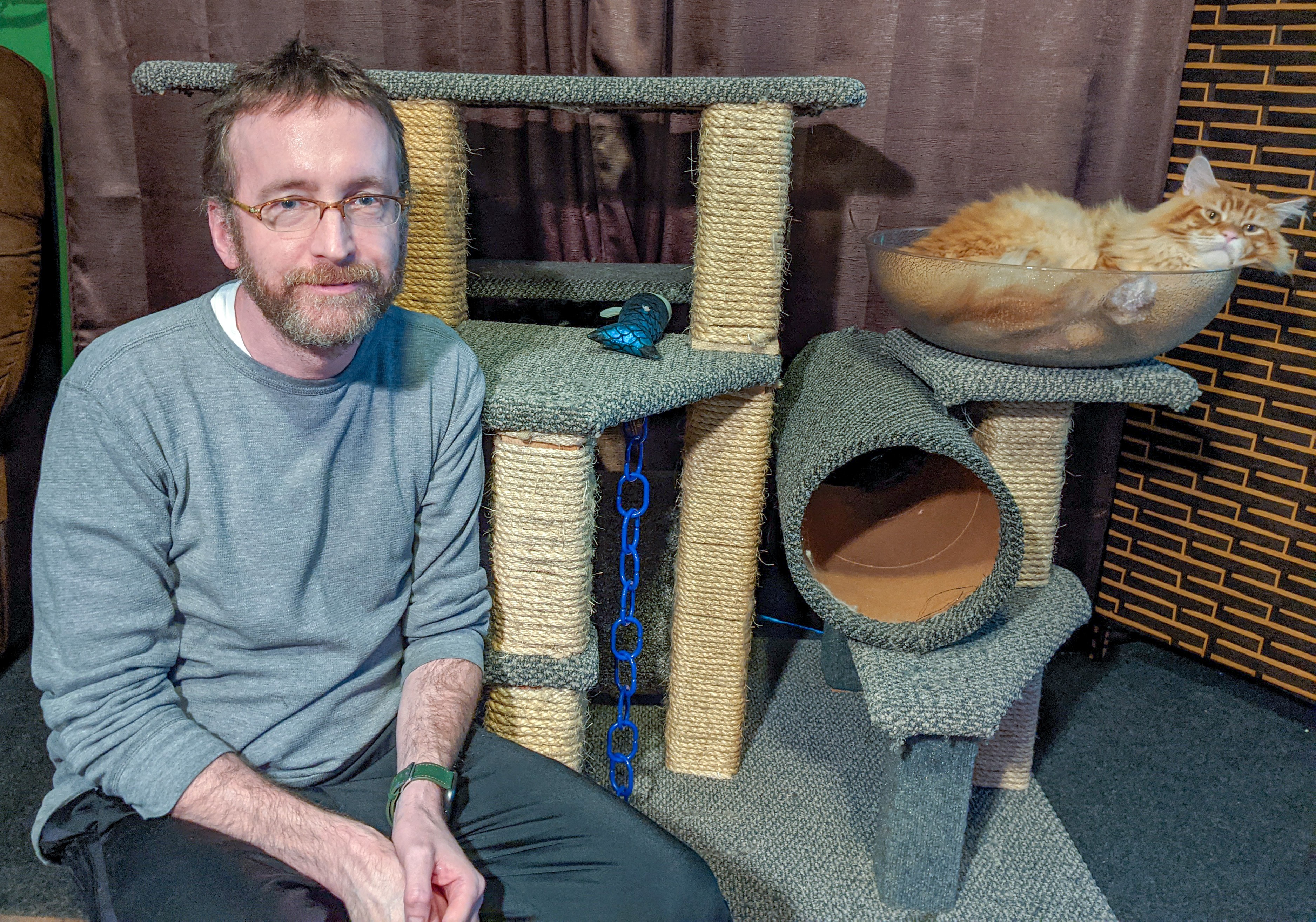 Rail Transit Supervisor Chris Becker with his Main coon cat Rufus.