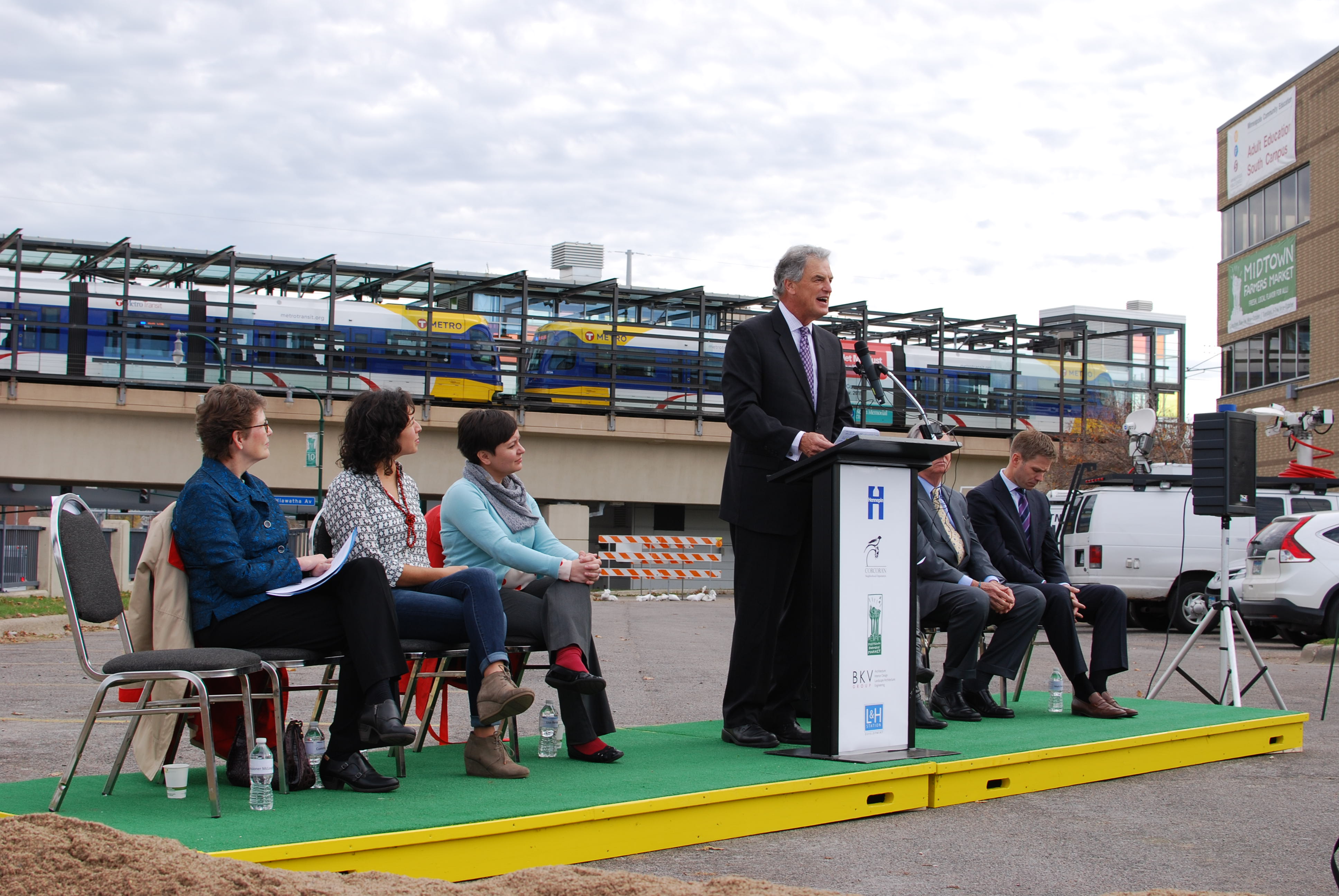 Hennepin County Commissioner Peter McLaughlin speaks at a groundbreaking ceremony for the county's new service center on Lake Street.