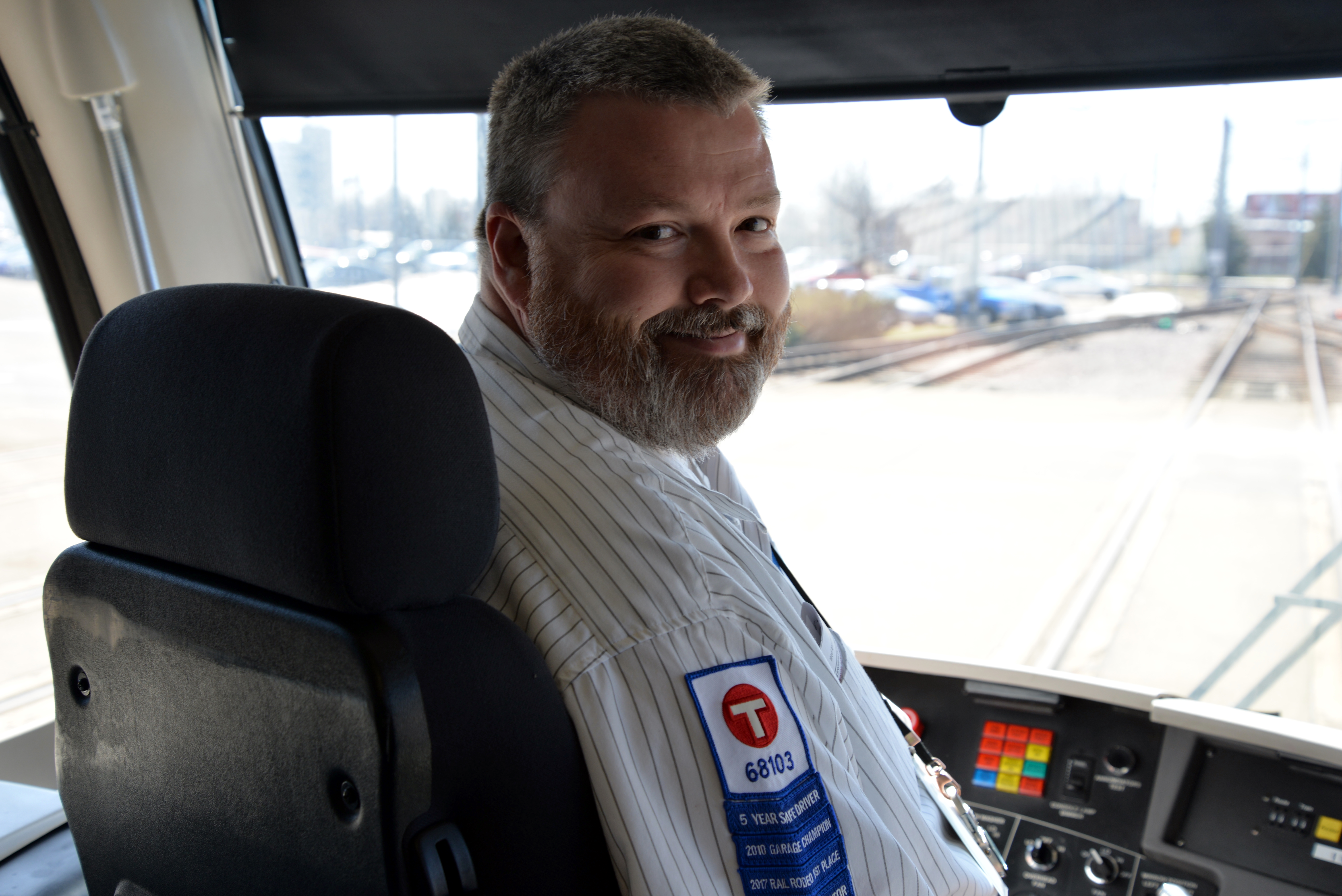 Metro Transit Train Operator Bill Morris in the cab of a light rail train. 